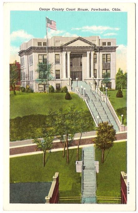 This is a linen postcard of the Orange County court House in Pawhuska